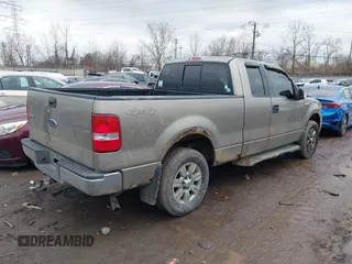 2004 Ford F-150 XLT with VIN 1FTPX14524NA34164, listed as a IAAI auction lot 41583236 with 168,780 mi miles. Bid and sale history available at carsss.com. Image 4.