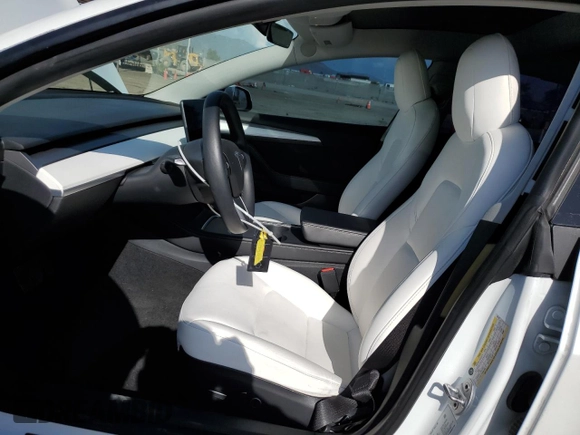 2021 Tesla Model 3 Standard Range Plus with VIN 5YJ3E1EA0MF072457, listed as a Copart auction lot 51666135 with 32,534 mi miles and Salvage Title. Bid and sale history available at carsss.com. Image 7.
