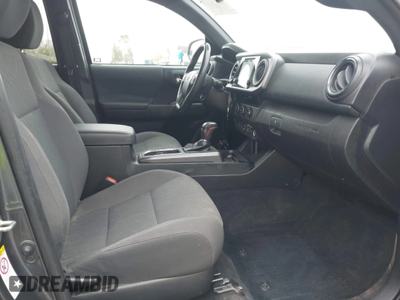 2018 Toyota Tacoma SR5 with VIN 3TMAZ5CN1JM071396, listed as a IAAI auction lot 42061640 with 122,148 mi miles and . Bid and sale history available at DreamBid. Image 5.