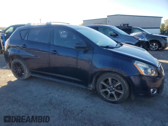 2009 Pontiac Vibe with VIN 5Y2SM67069Z401681, listed as a Copart auction lot 76338944 with 191,368 mi miles and Salvage Title. Bid and sale history available at carsss.com. Image 4.
