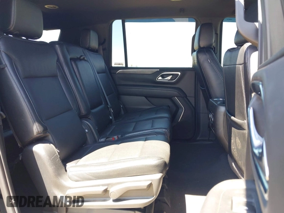 2023 Chevrolet Suburban LS z VIN 1GNSCBKD3PR457569, wystawiony jako IAAI lot #42225571 z przebiegiem 53 410 mil mil oraz . Historia ofert i sprzedaży dostępna na DreamBid. Obrazek 8.