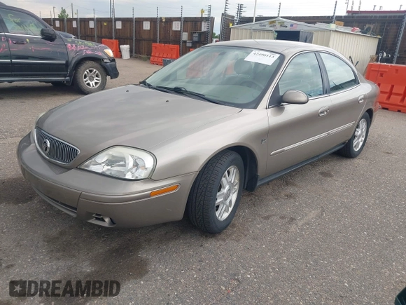 2005 Mercury Sable LS z VIN 1MEFM55S85A605535, wystawiony jako IAAI lot #42490113 z przebiegiem 112 031 mil mil oraz . Historia ofert i sprzedaży dostępna na DreamBid. Obrazek 2.