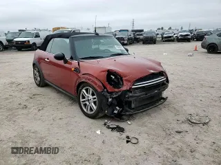 2012 MINI Convertible z VIN WMWZN3C59CT135172, wystawiony jako Copart lot #45593815 z przebiegiem 154 477 mil mil oraz Szkoda całkowita • Salvage title. Historia ofert i sprzedaży dostępna na DreamBid. Obrazek 11.