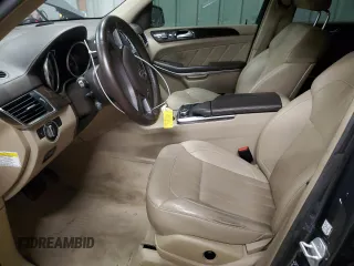 2014 Mercedes-Benz GL 450 z VIN 4JGDF7CE1EA311613, wystawiony jako Copart lot #52624995 z przebiegiem 134 404 mil mil oraz Tytuł czysty. Historia ofert i sprzedaży dostępna na DreamBid. Obrazek 7.