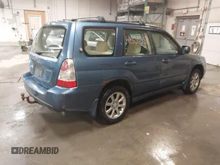 2007 Subaru Forester X w/Premium Pkg with VIN JF1SG65687G716673, listed as a IAAI auction lot 41539553 with 186,870 mi miles. Bid and sale history available at carsss.com. Image 4.