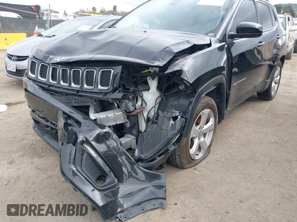 2018 Jeep Compass Altitude with VIN 3C4NJDBB0JT484409, listed as a IAAI auction lot 41656179 with 85,436 mi miles and . Bid and sale history available at carsss.com. Image 6.