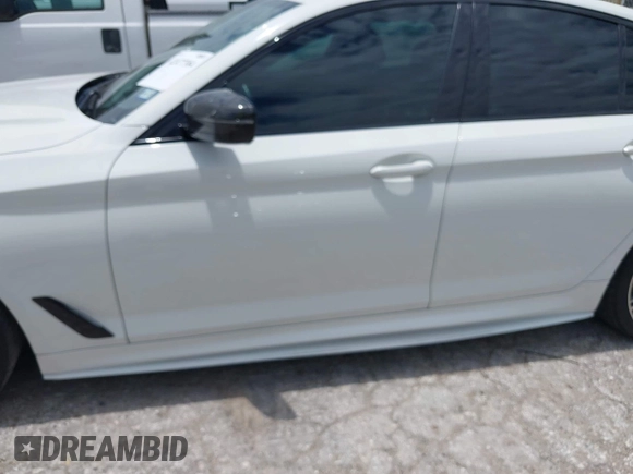 2019 BMW 5 Series 540i with VIN WBAJE5C54KWW08398, listed as a IAAI auction lot 42477384 with 48,936 mi miles and . Bid and sale history available at DreamBid. Image 6.