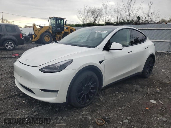 2023 Tesla Model Y Long Range with VIN 7SAYGDEE0PF746778, listed as a Copart auction lot 52704965 with 19,047 mi miles and Salvage Title. Bid and sale history available at DreamBid. Image 1.