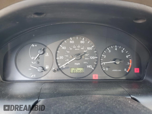 1997 Mazda Protege DX z VIN JM1BC1412V0157268, wystawiony jako Copart lot #61380564 z przebiegiem 85 356 mil mil oraz Szkoda całkowita • Salvage title. Historia ofert i sprzedaży dostępna na DreamBid. Obrazek 9.