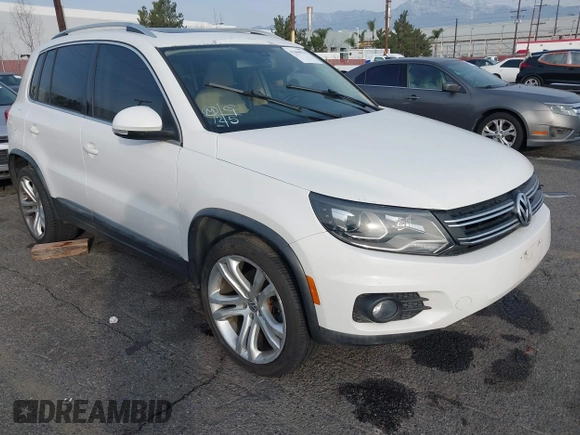 2012 Volkswagen Tiguan SE z VIN WVGAV7AX6CW535969, wystawiony jako IAAI lot #41464523 z przebiegiem 138 858 mil mil oraz . Historia ofert i sprzedaży dostępna na DreamBid. Obrazek 1.