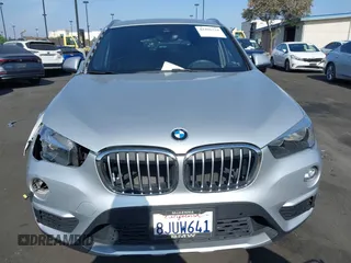 2019 BMW X1 xDrive28i with VIN WBXHT3C56K5L38658, listed as a IAAI auction lot 42496734 with 49,373 mi miles and . Bid and sale history available at DreamBid. Image 12.