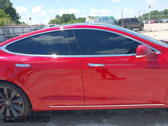 2016 Tesla Model S 90D with VIN 5YJSA1E48GF144821, listed as a IAAI auction lot 42206473 with 129,624 mi miles and . Bid and sale history available at DreamBid. Image 13.