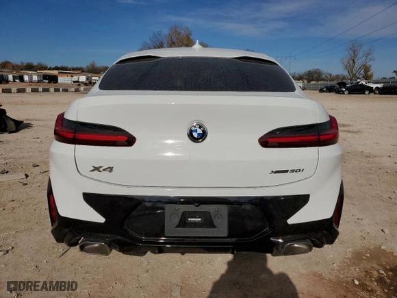 2023 BMW X4 xDrive30i with VIN 5UX33DT01P9P53029, listed as a Copart auction lot 84286824 with NaN miles and Salvage Title. Bid and sale history available at carsss.com. Image 6.