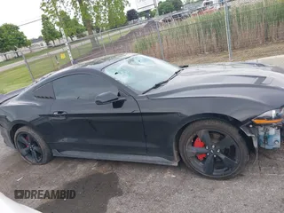 2021 Ford Mustang EcoBoost z VIN 1FA6P8TH7M5132841, wystawiony jako IAAI lot #42364830 z przebiegiem 22 331 mil mil oraz . Historia ofert i sprzedaży dostępna na DreamBid. Obrazek 13.