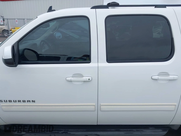 2012 Chevrolet Suburban LT with VIN 1GNSCJE00CR165813, listed as a IAAI auction lot 42494042 with 205,998 mi miles and . Bid and sale history available at DreamBid. Image 14.