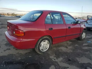 1997 Hyundai Accent z VIN KMHVF24N9VU356190, wystawiony jako Copart lot #85610774 z przebiegiem 91 707 mil mil oraz Tytuł czysty. Historia ofert i sprzedaży dostępna na DreamBid. Obrazek 3.