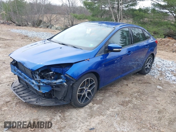 2018 Ford Focus SE z VIN 1FADP3F25JL255840, wystawiony jako IAAI lot #41852913 z przebiegiem 64 010 mil mil oraz . Historia ofert i sprzedaży dostępna na DreamBid. Obrazek 2.