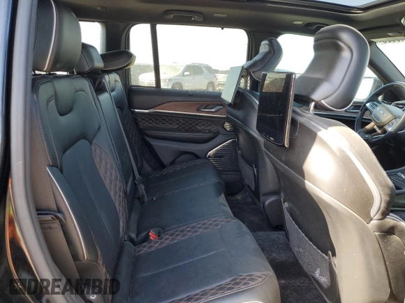 2023 Jeep Grand Cherokee Summit Reserve z VIN 1C4RJYE62PC652630, wystawiony jako Copart lot #55110525 z przebiegiem 21 186 mil mil oraz Szkoda całkowita • Salvage title. Historia ofert i sprzedaży dostępna na DreamBid. Obrazek 11.