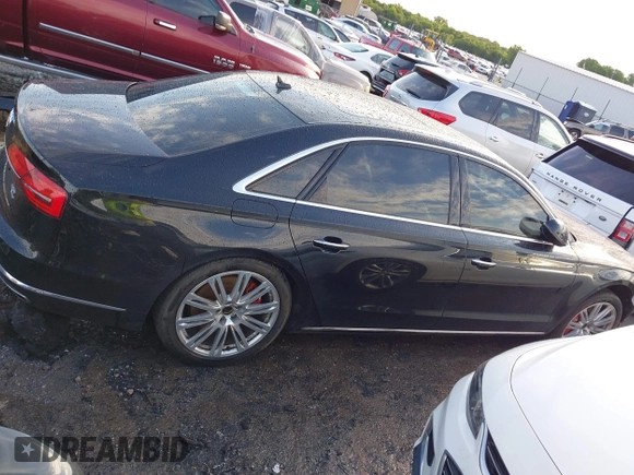 2015 Audi A8 4.0T z VIN WAU32AFD6FN022648, wystawiony jako IAAI lot #42358142 z przebiegiem 103 416 mil mil oraz . Historia ofert i sprzedaży dostępna na DreamBid. Obrazek 14.