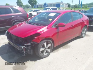 2018 Kia Forte LX z VIN 3KPFL4A74JE203440, wystawiony jako IAAI lot #42221626 z przebiegiem 161 264 mil mil oraz . Historia ofert i sprzedaży dostępna na DreamBid. Obrazek 2.