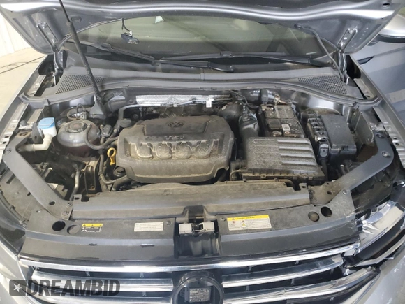 2022 Volkswagen Tiguan SE z VIN 3VV3B7AX6NM034235, wystawiony jako Copart lot #57259615 z przebiegiem 65 424 mil mil oraz Czysty tytuł • Clean title. Historia ofert i sprzedaży dostępna na DreamBid. Obrazek 12.