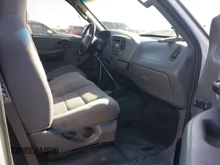2003 Ford F-150 XL with VIN 1FTRF17293NA46808, listed as a IAAI auction lot 41156923 with 384,475 mi miles and . Bid and sale history available at DreamBid. Image 5.