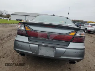 2004 Pontiac Bonneville SLE z VIN 1G2HY52K24U164098, wystawiony jako Copart lot #82283344 z przebiegiem 132 456 mil mil oraz Szkoda całkowita • Salvage title. Historia ofert i sprzedaży dostępna na DreamBid. Obrazek 6.