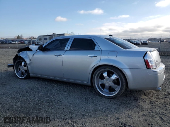 2005 Chrysler 300 C with VIN 2C3AA63H15H674199, listed as a Copart auction lot 47628215 with 154,052 mi miles and Salvage Title. Bid and sale history available at DreamBid. Image 2.