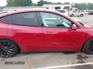 2022 Tesla Model Y Performance z VIN 7SAYGDEF6NF511436, wystawiony jako IAAI lot #42078122 z przebiegiem 44 006 mil mil oraz . Historia ofert i sprzedaży dostępna na DreamBid. Obrazek 13.