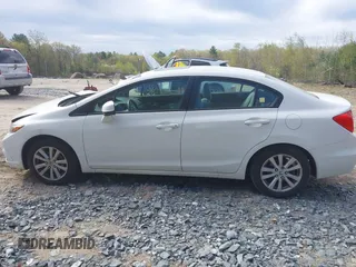 2012 Honda Civic EX with VIN 2HGFB2F81CH607670, listed as a IAAI auction lot 42128341 with 104,090 mi miles and . Bid and sale history available at DreamBid. Image 14.