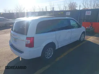 2015 Chrysler Town & Country LX with VIN 2C4RC1AG1FR678142, listed as a IAAI auction lot 41016680 with 78,756 mi miles and . Bid and sale history available at carsss.com. Image 4.