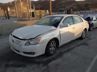 2008 Toyota Avalon XL with VIN 4T1BK36B38U272121, listed as a IAAI auction lot 41200326 with 138,260 mi miles. Bid and sale history available at carsss.com. Image 2.