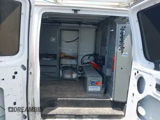 2010 Ford Econoline Cargo Commercial with VIN 1FTNE2EL7ADA74595, listed as a IAAI auction lot 42512878 with 154,412 mi miles and . Bid and sale history available at DreamBid. Image 8.
