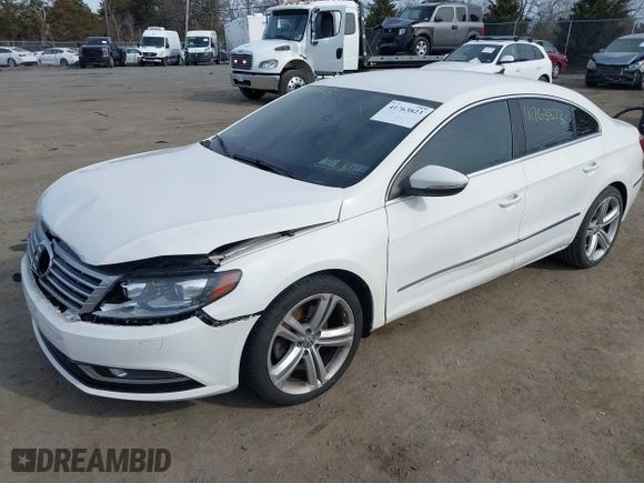 2013 Volkswagen CC Sport with VIN WVWBP7AN2DE546296, listed as a IAAI auction lot 41763823 with 102,028 mi miles. Bid and sale history available at carsss.com. Image 2.