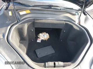 2014 Tesla Model S 60 z VIN 5YJSA1H11EFP30596, wystawiony jako IAAI lot #42235901 z przebiegiem 143 837 mil mil oraz . Historia ofert i sprzedaży dostępna na DreamBid. Obrazek 10.