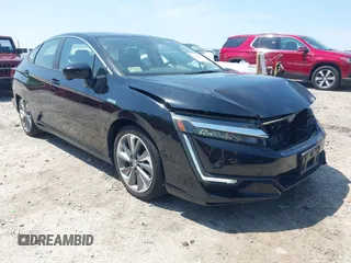 2018 Honda Clarity Plug-In Hybrid Touring with VIN JHMZC5F33JC011358, listed as a IAAI auction lot 42010720 with 61,366 mi miles. Bid and sale history available at carsss.com. Image 1.