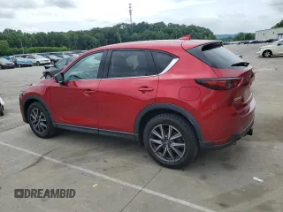 2018 Mazda CX-5 Grand Touring with VIN JM3KFADM8J0444455, listed as a Copart auction lot 59793055 with 60,839 mi miles and Salvage title. Bid and sale history available at DreamBid. Image 2.