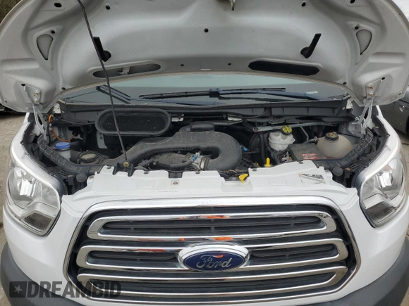 2017 Ford Transit z VIN 1FTYR1YM8HKA78211, wystawiony jako Copart lot #53779825 z przebiegiem 16 834 mil mil oraz Szkoda całkowita • Salvage title. Historia ofert i sprzedaży dostępna na DreamBid. Obrazek 12.