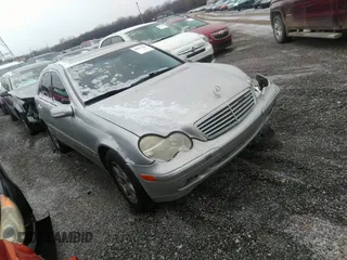 2003 Mercedes-Benz C 2.6L with VIN WDBRF61J13E012597, listed as a IAAI auction lot 40471114 with Not Provided miles. Bid and sale history available at carsss.com. Image 1.