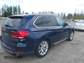 2015 BMW X5 xDrive35d with VIN 5UXKS4C55F0J98874, listed as a IAAI auction lot 42030583 with 151,079 mi miles. Bid and sale history available at carsss.com. Image 4.