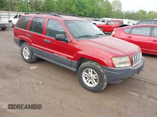 2004 Jeep Grand Cherokee Laredo with VIN 1J4GW48S64C371253, listed as a IAAI auction lot 42099607 with 260,618 mi miles. Bid and sale history available at carsss.com. Image 1.