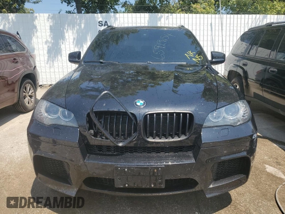 2011 BMW X5 M with VIN 5YMGY0C55BLK27157, listed as a Copart auction lot 65929154 with 0 mi miles and Salvage Title. Bid and sale history available at carsss.com. Image 5.