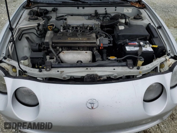 1995 Toyota Celica ST z VIN JT2AT00F8S0037180, wystawiony jako Copart lot #74536414 z przebiegiem Nie podano mil oraz Szkoda całkowita • Salvage title. Historia ofert i sprzedaży dostępna na DreamBid. Obrazek 11.
