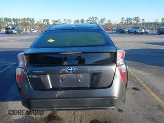 2017 Toyota Prius Two z VIN JTDKARFU4H3042976, wystawiony jako IAAI lot #41740418 z przebiegiem 66 734 mil mil oraz . Historia ofert i sprzedaży dostępna na DreamBid. Obrazek 16.