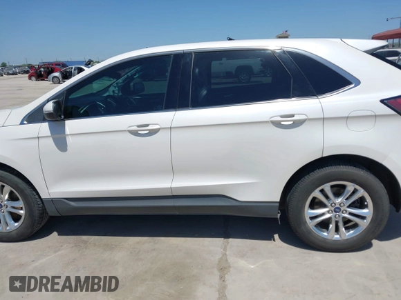 2015 Ford Edge SEL with VIN 2FMTK3J97FBC16209, listed as a IAAI auction lot 41974393 with 129,608 mi miles. Bid and sale history available at carsss.com. Image 15.