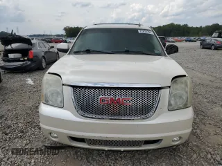 2011 GMC Yukon Denali with VIN 1GKS1EEFXBR313625, listed as a Copart auction lot 72634294 with 129,834 mi miles and Salvage Title. Bid and sale history available at carsss.com. Image 5.