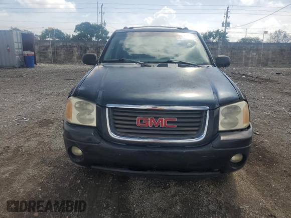 2004 GMC Envoy SLE with VIN 1GKDS13S942114009, listed as a Copart auction lot 67276454 with 178,107 mi miles and Salvage Title. Bid and sale history available at DreamBid. Image 5.
