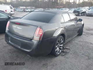 2014 Chrysler 300 S with VIN 2C3CCABG2EH352220, listed as a IAAI auction lot 41796284 with 127,070 mi miles and . Bid and sale history available at DreamBid. Image 4.