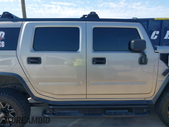 2003 Hummer H2 with VIN 5GRGN23U43H125114, listed as a IAAI auction lot 42160986 with 157,776 mi miles. Bid and sale history available at carsss.com. Image 13.