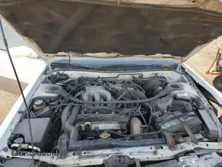 1990 Lexus ES z VIN JT8VV22T5L0096463, wystawiony jako Copart lot #70032254 z przebiegiem 127 414 mil mil oraz Szkoda całkowita • Salvage title. Historia ofert i sprzedaży dostępna na DreamBid. Obrazek 11.